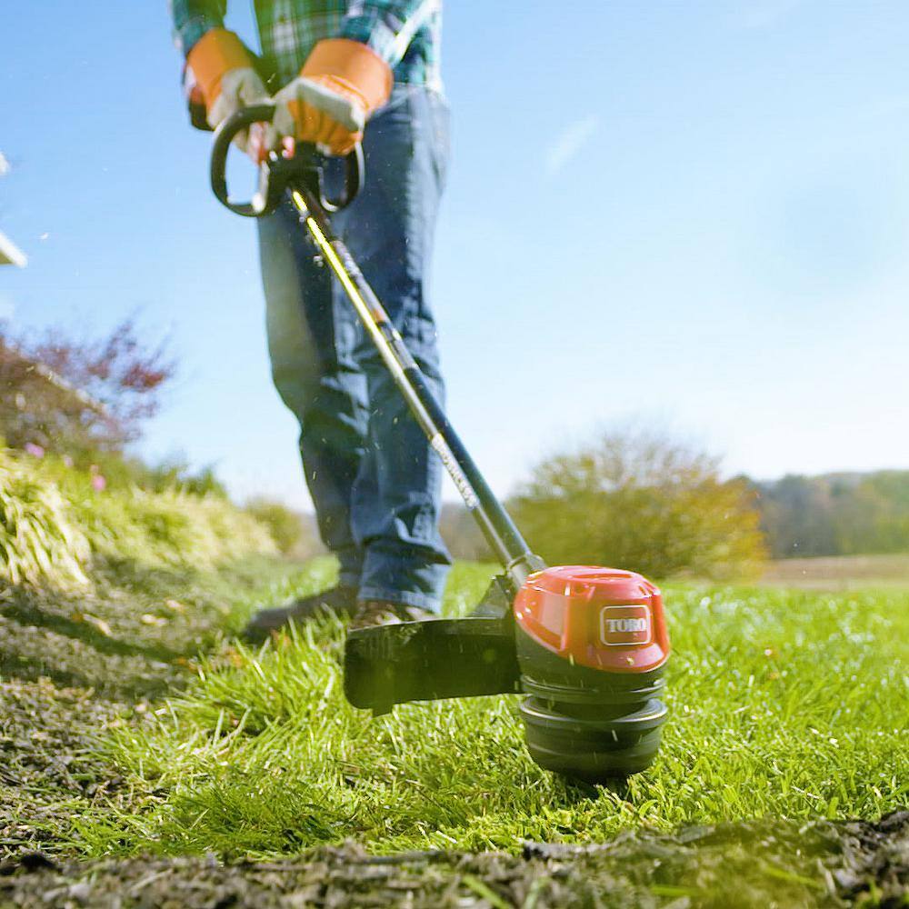 Toro 60V Max Lithium-Ion Brushless Cordless 15 in.  13 in. String Trimmer - 2.0 Ah Battery and Charger Included 51831