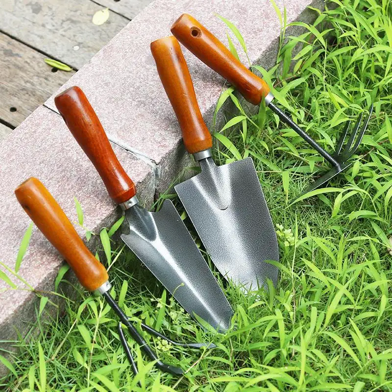 Wholesales Price Thickened 4 PCS Wooden Metal Gardening Hand Shovel Rake Tool Set Heavy Duty For Household Planting Flowers