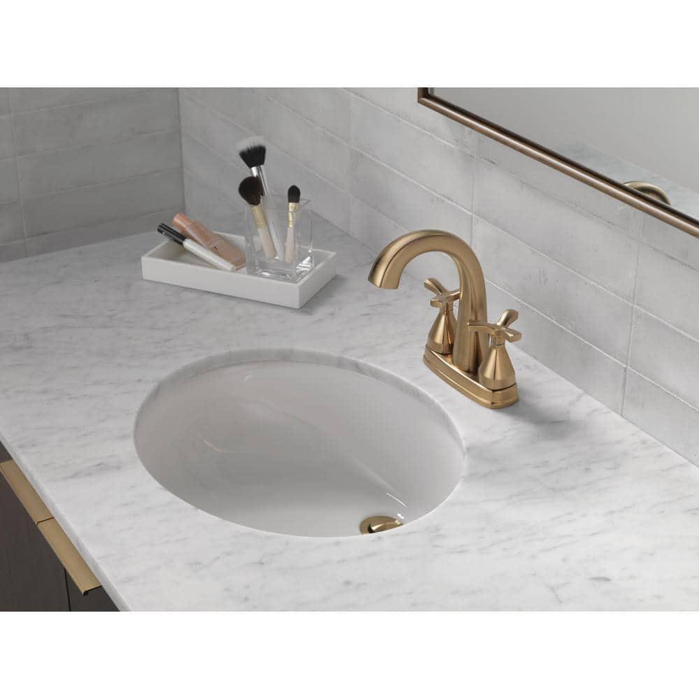 Delta Stryke 4 in Centerset 2Handle Bathroom Faucet with Metal Drain Assembly in Champagne Bronze