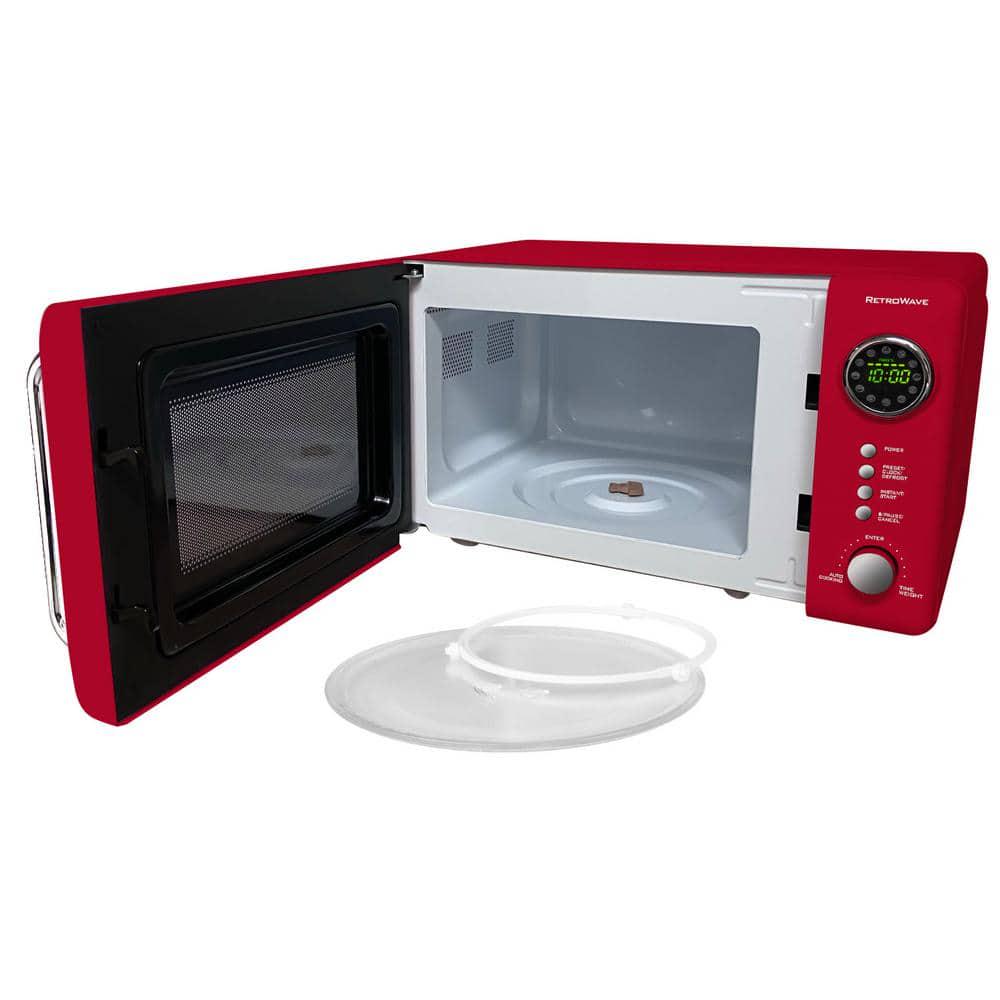 Nostalgia Retro 07 cu ft 700Watt Countertop Microwave Oven in Red