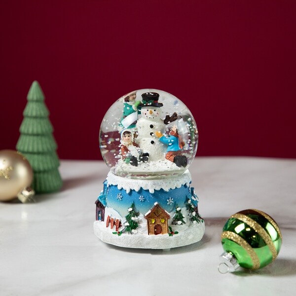 Children Building Snowman Musical Christmas Snow Globe