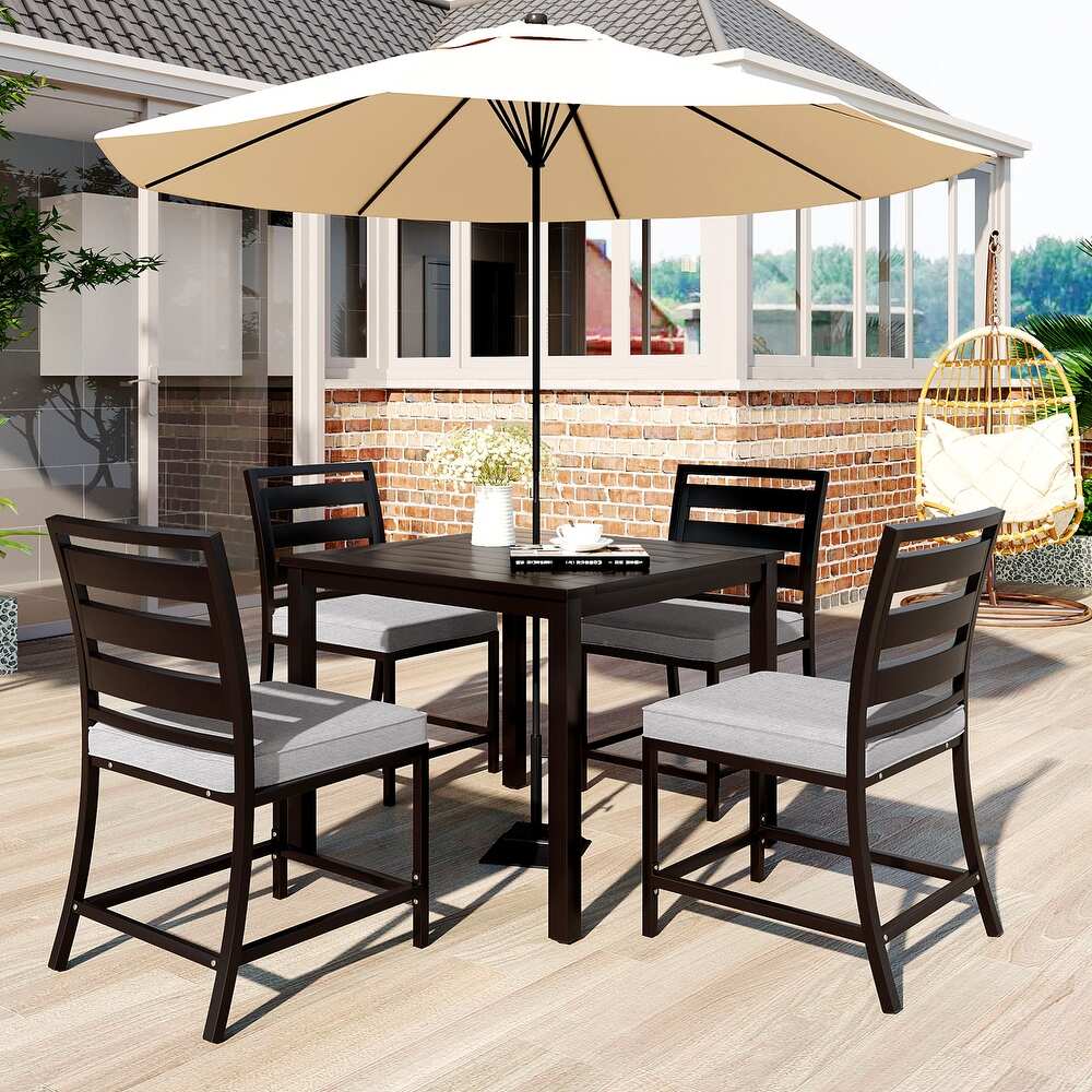 Outdoor four person dining table and chairs are suitable