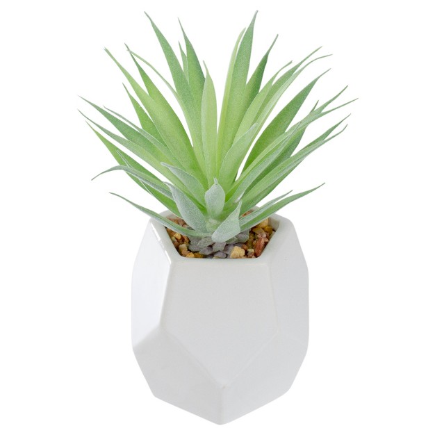 Green Artificial Sword Grass In A White Geometric Pot