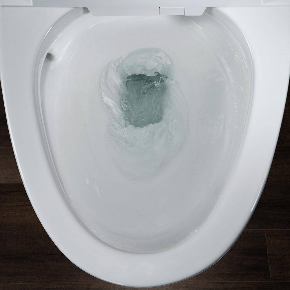 WOODBRIDGE Intelligent Comfort Height 1-Piece 1.1 GPF1.6 GPF Dual Flush Elongated Toilet in White Seat Included HT0068