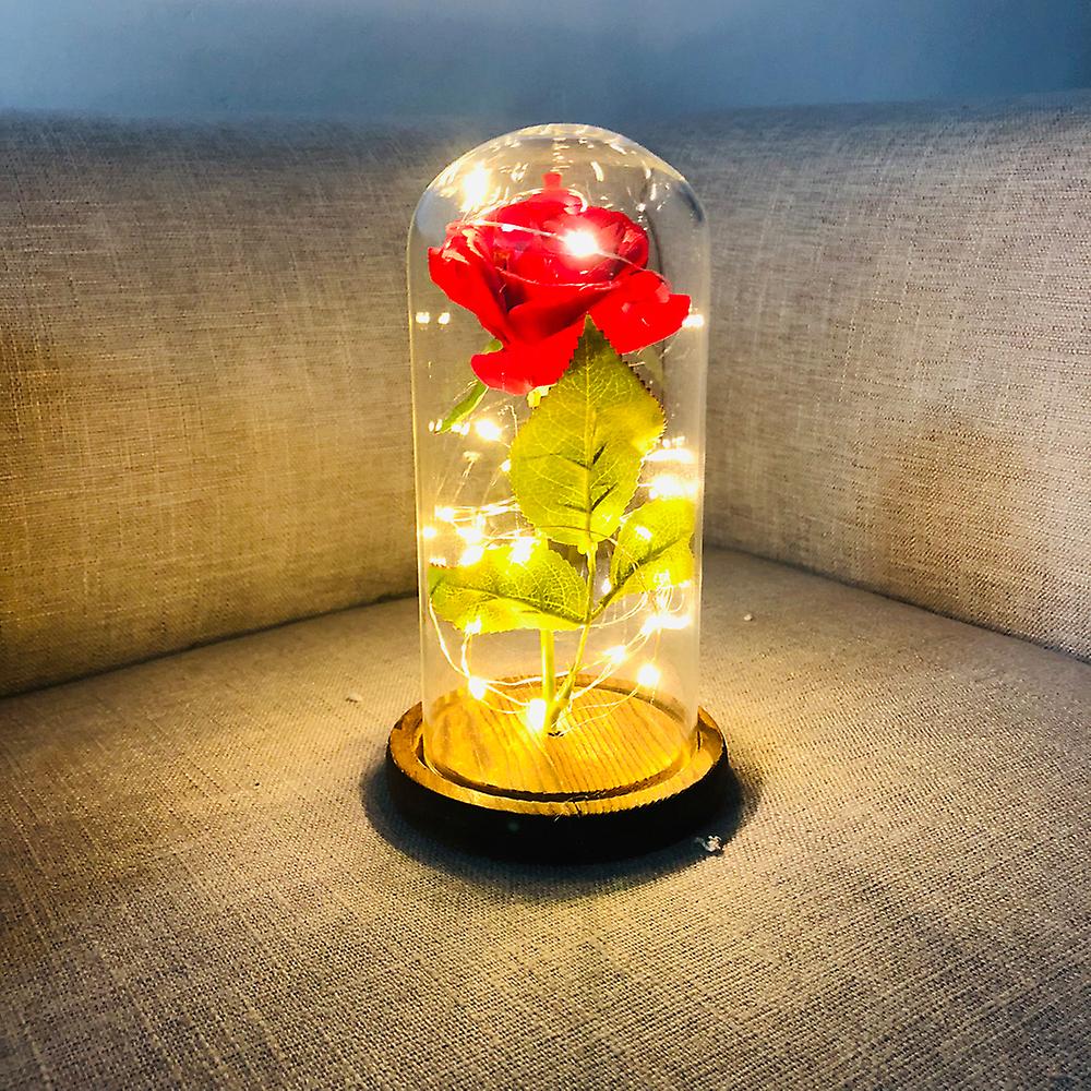 1 Rose Flower 1 Glass Cover 1 Wooden Base 1 String Light Brown