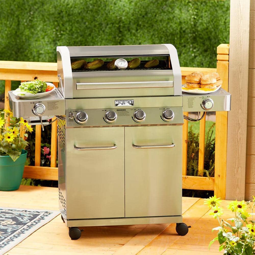 Monument Grills 4-Burner Propane Gas Grill in Stainless with Clear View Lid, LED Controls, Side and Sear Burners 35633