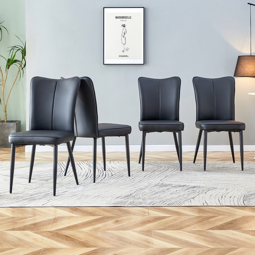 Modern dining chairs. 4 piece set of light gray PU seats with black metal legs. Suitable for restaurants  living rooms