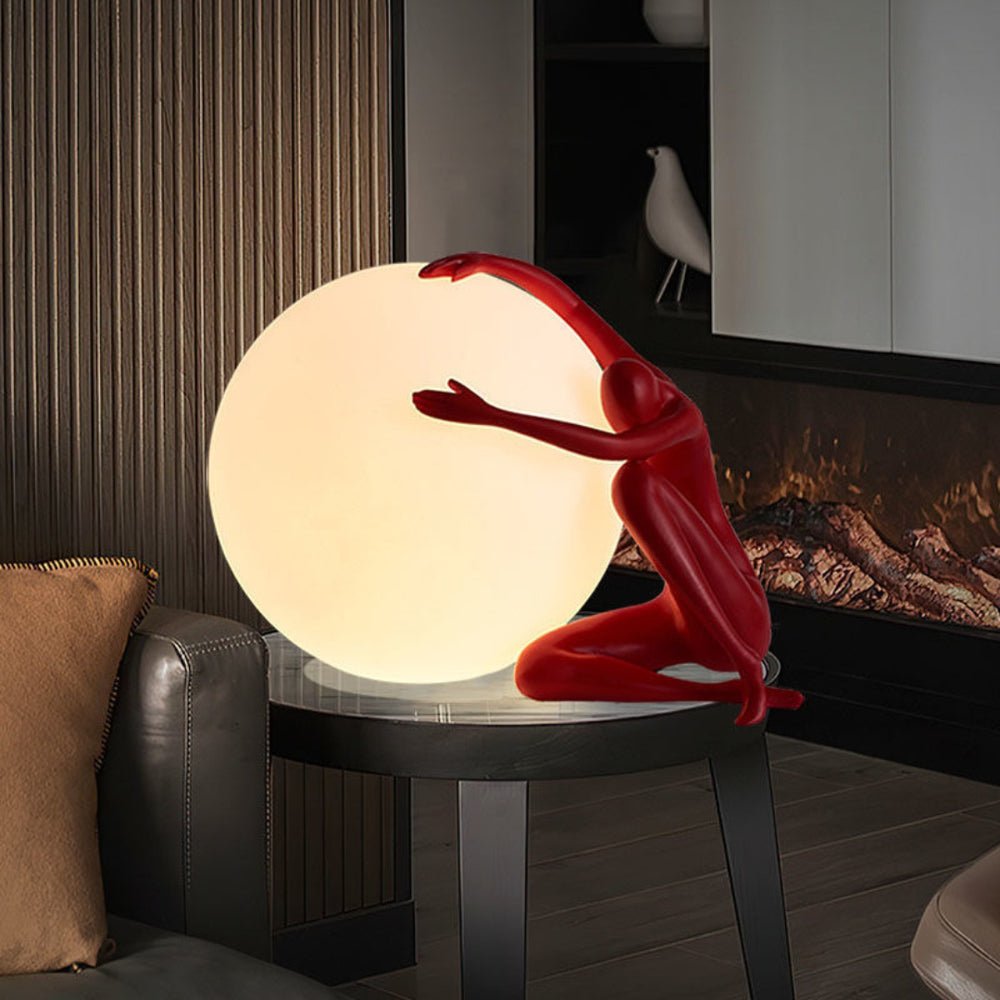 Humanoid Ball Holding Table Lamp