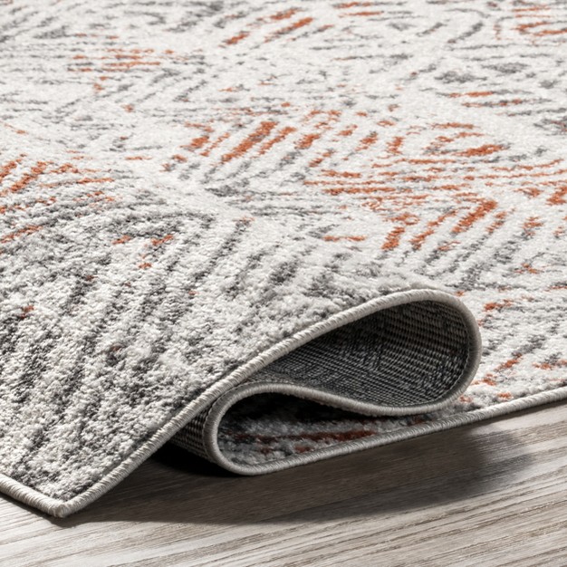 Cathrine Geometric Distressed Area Rug