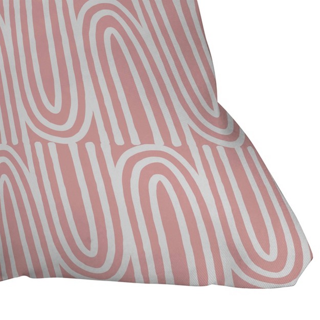 Mirimo Bows Outdoor Throw Pillow Pink white Deny Designs