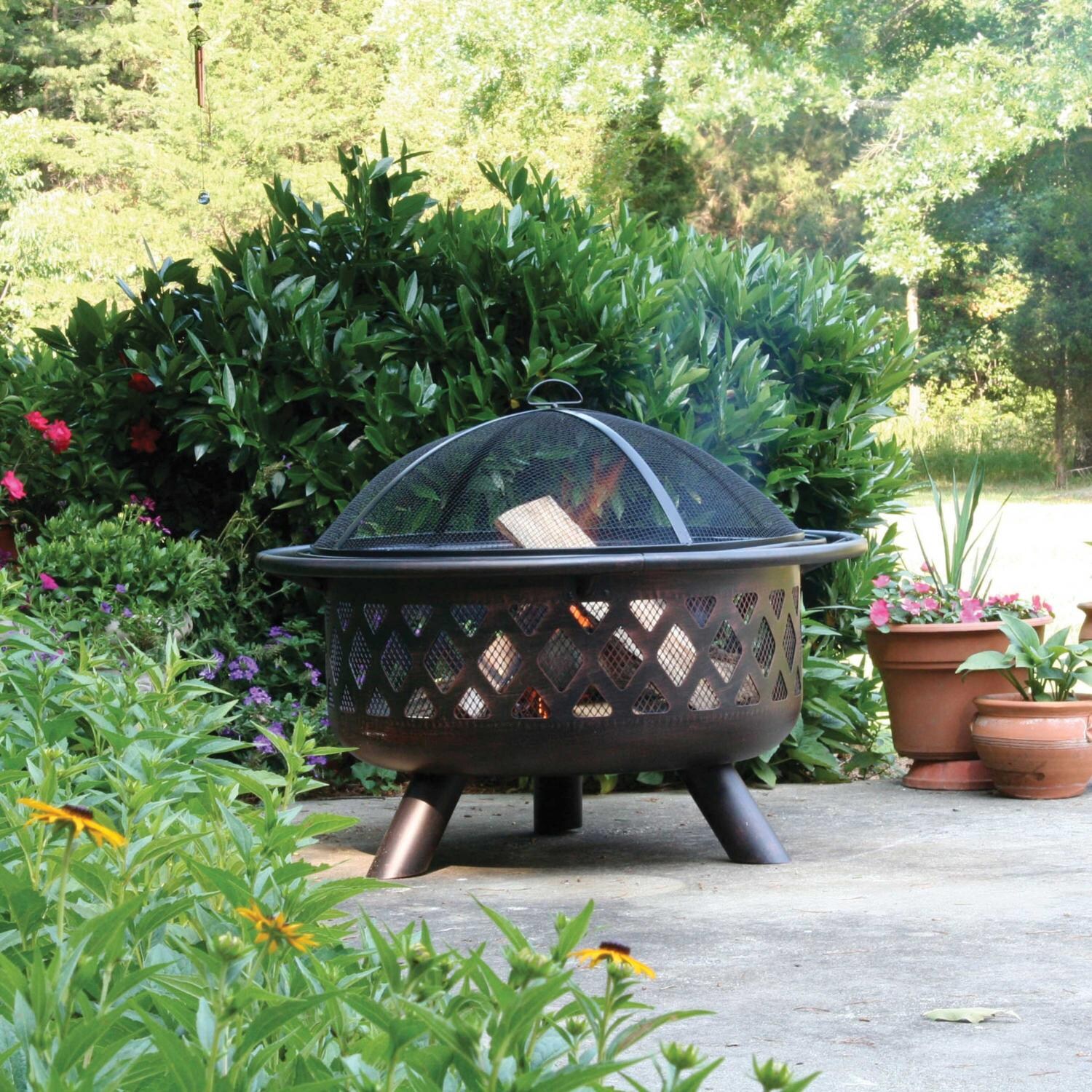 UniFlame 30 Inch Oil Rubbed Bronze Firebowl Fire Pit With Lattice Tree Design