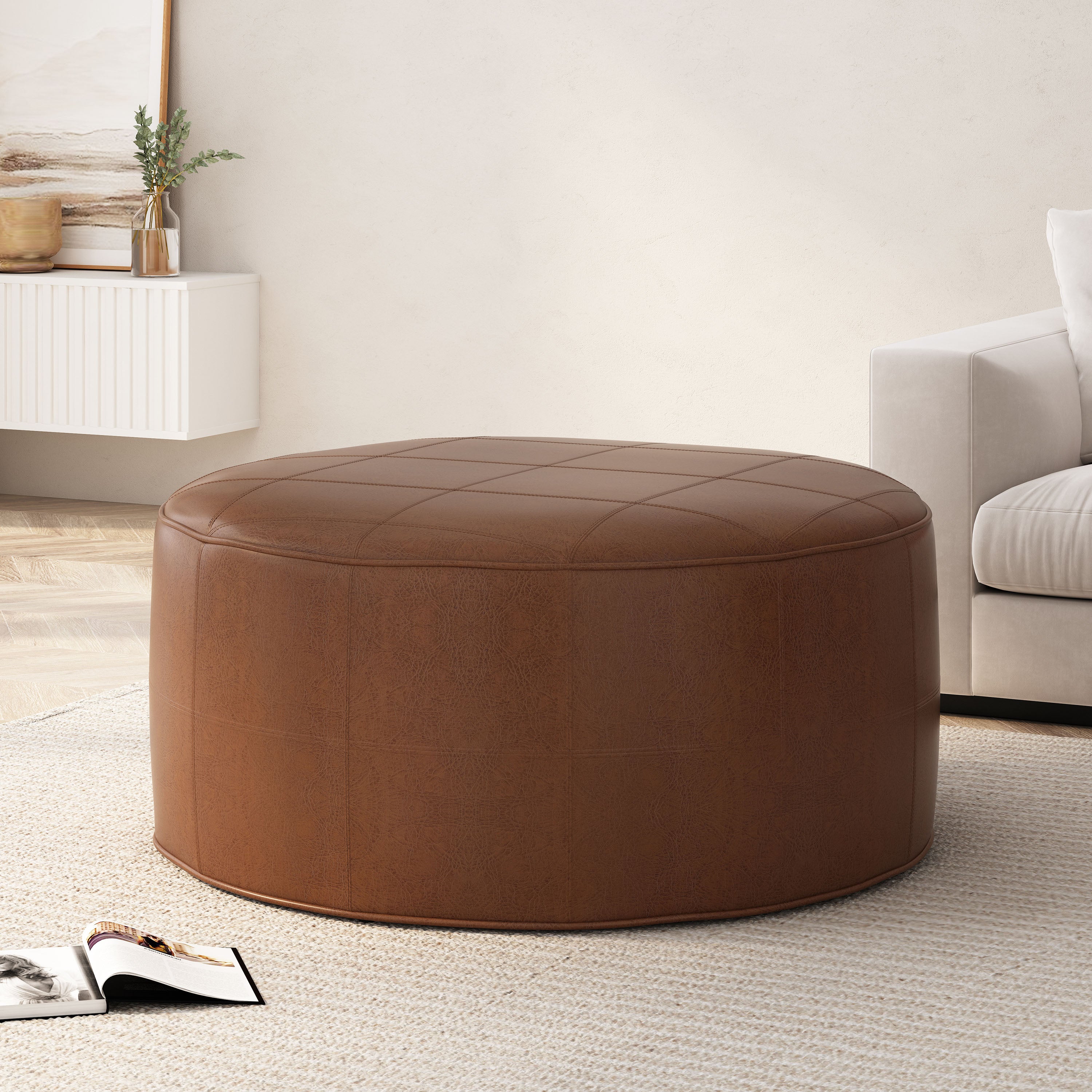 Dored Faux Leather Upholstered Ottoman