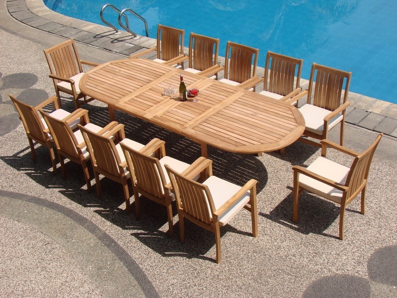 9 Piece Outdoor Teak Dining Set  117 quotOval Table  8 Wave Stacking Arm Chairs   Traditional   Outdoor Dining Sets   by Teak Deals  Houzz