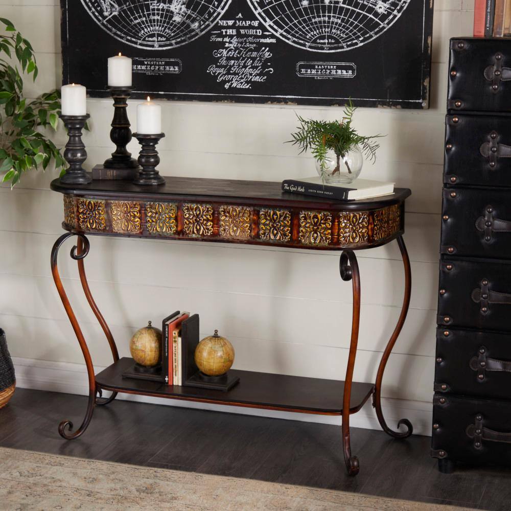 Litton Lane 43 in. Brown Extra Large Rectangle Metal Embossed 1 Shelf Floral Console Table with Ornate Scroll Legs 74362