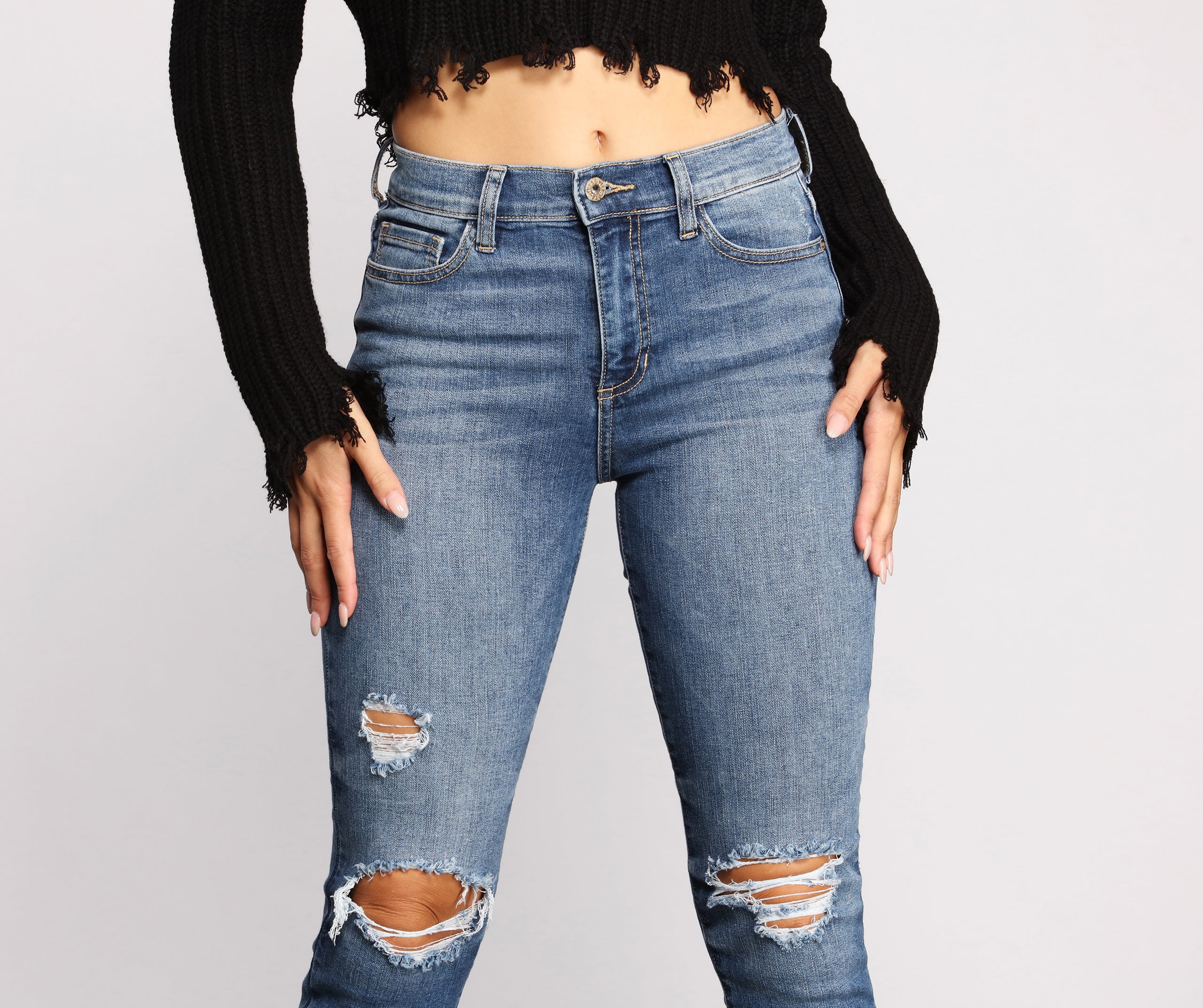 Mid-Rise Destructed Skinny Jeans