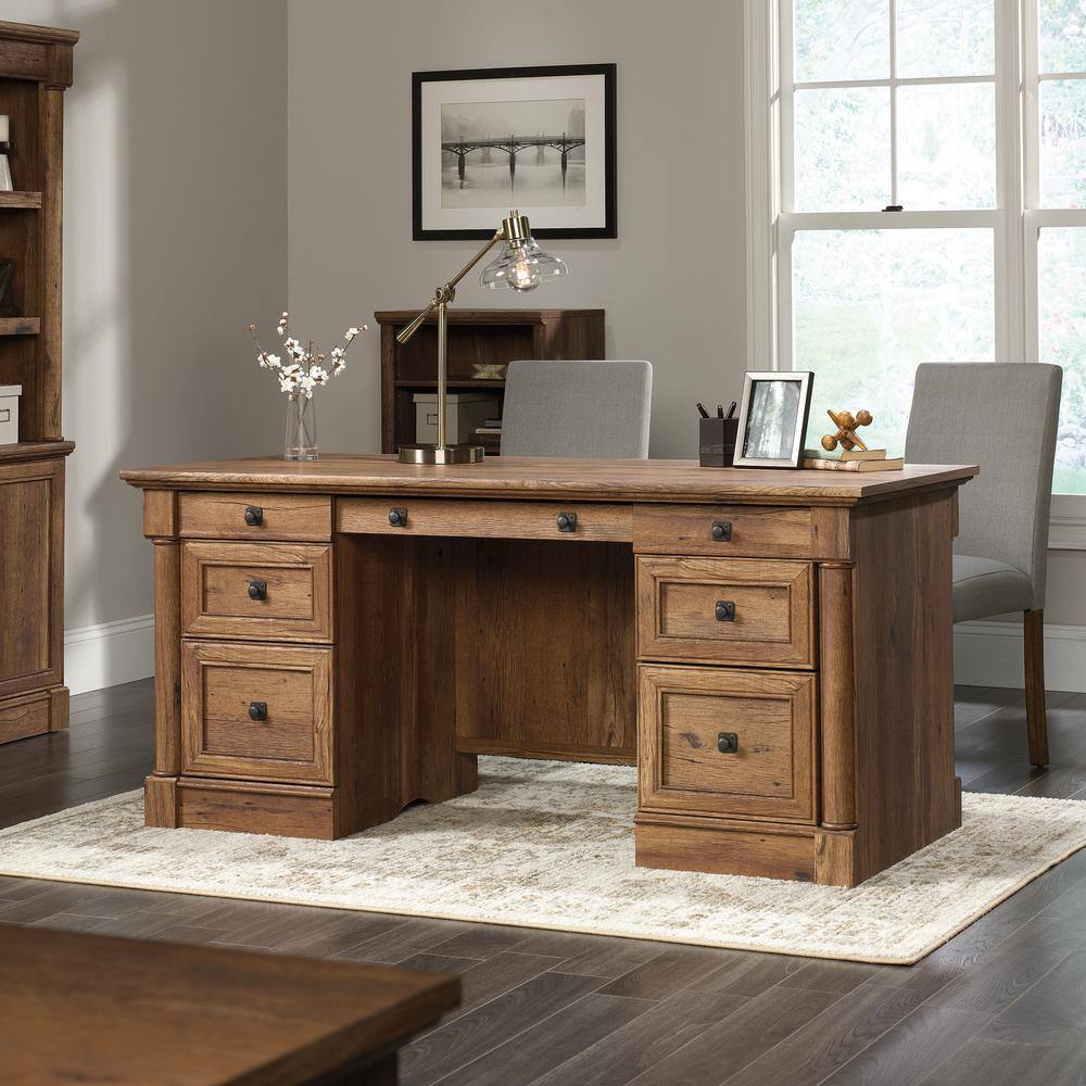 SAUDER 66 in. Rectangular Vintage Oak 6 Drawer Executive Desk with Keyboard Tray 420604