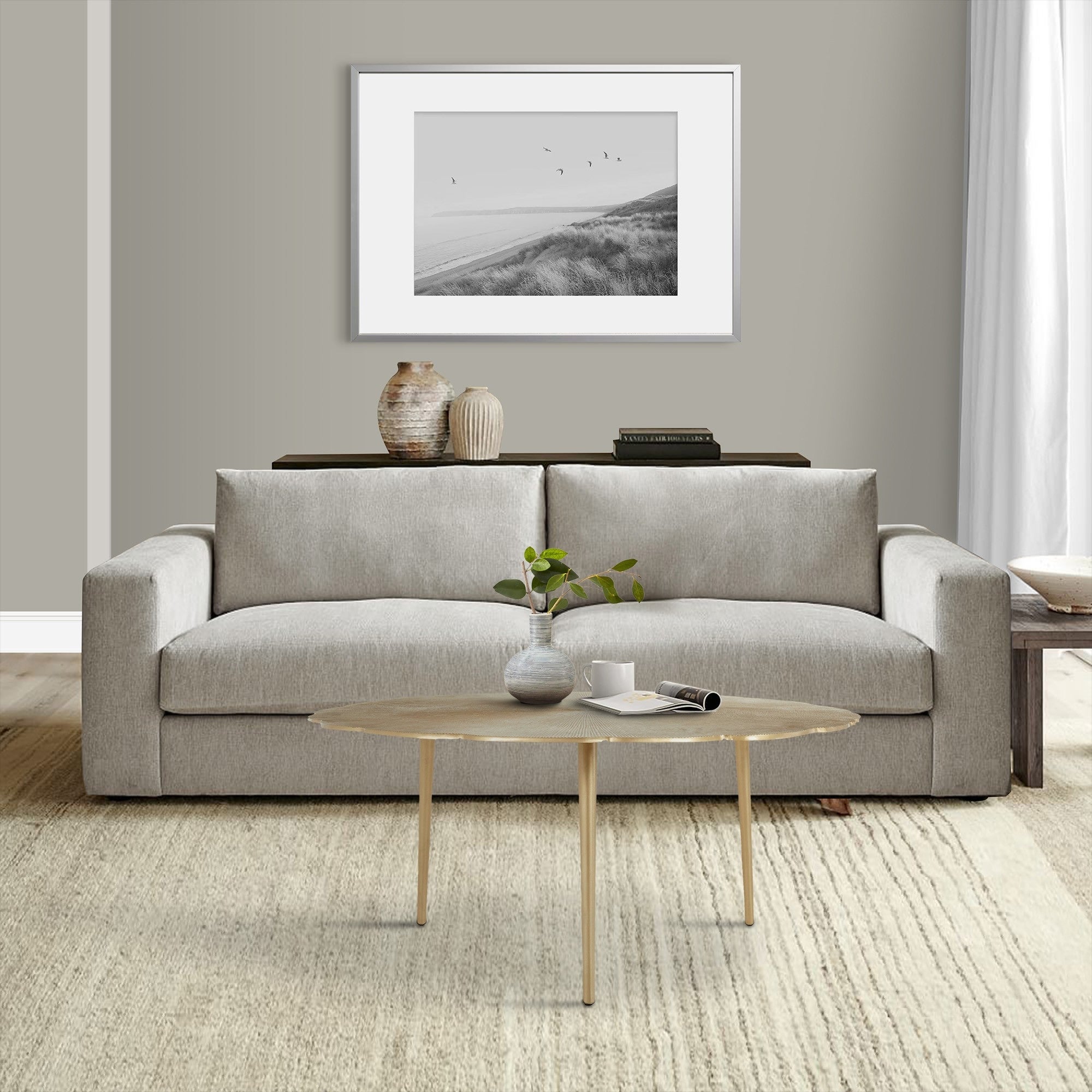 Tia 40 Inch Modern Coffee Table， Solid Aluminum Frame， Tapered Legs， Gold