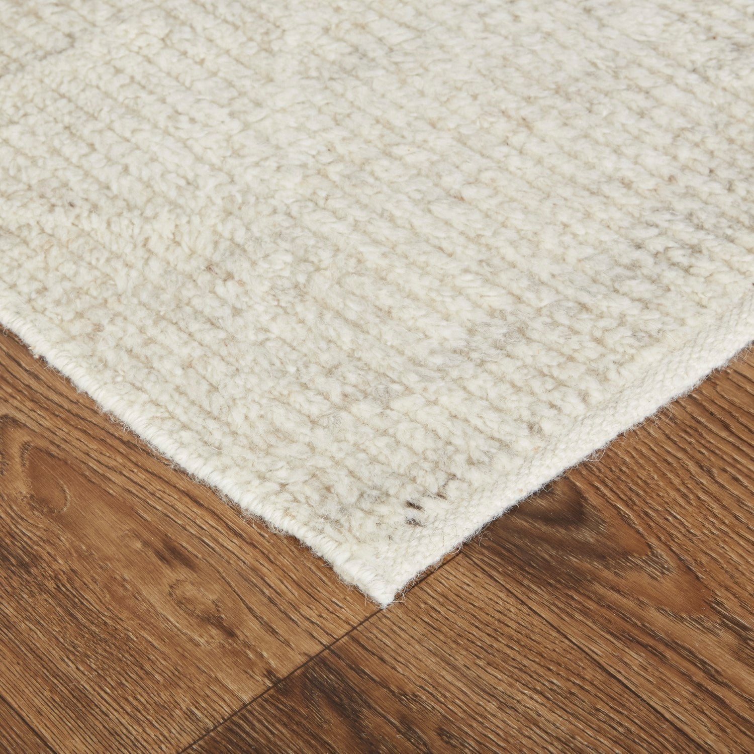 Rheed Solid Color Ivory/Beige Rug