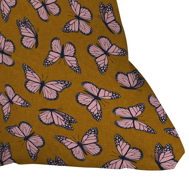 Little Arrow Design Co Monarch Butterflies Outdoor Throw Pillow Pink brown Deny Designs