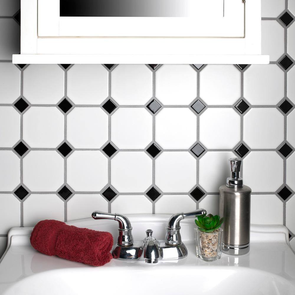 Merola Tile Metro Octagon Matte White wBlack Dot 11 12 in. x 11 12 in. Porcelain Mosaic  9.4 sq. ft. Case FXLM2OWD