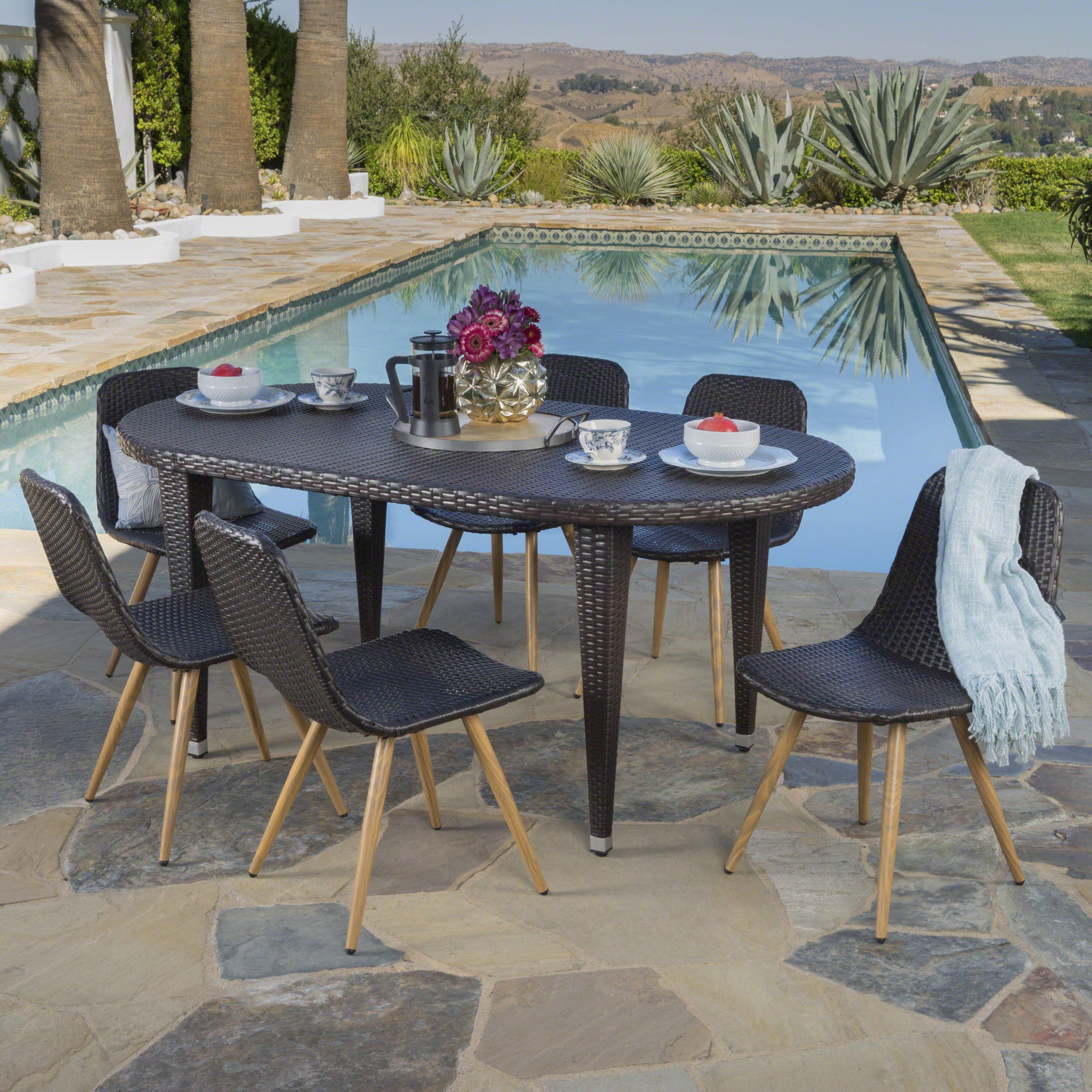 Lynda Outdoor 7 Piece Wicker Oval Dining Set with Wood Finished Legs