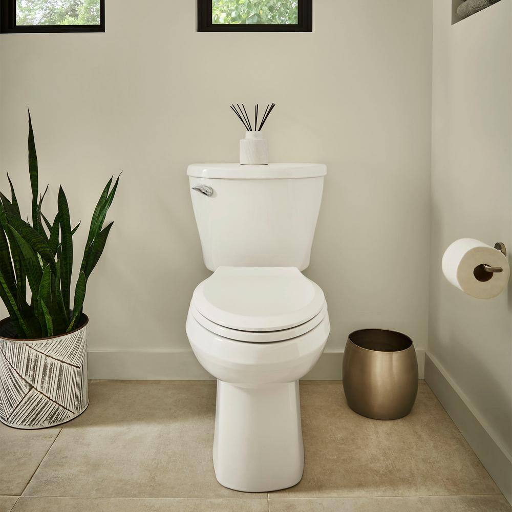 American Standard Reliant 2-piece 1.28 GPF Single Flush Elongated Toilet in White Seat Included 773CA101.020