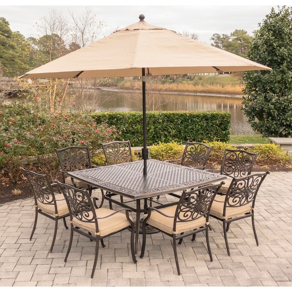 Hanover Traditions 9 Piece Dining Set in Tan with Square 60 In. Cast Top Dining Table  11 Ft. Table Umbrella  and Umbrella Base