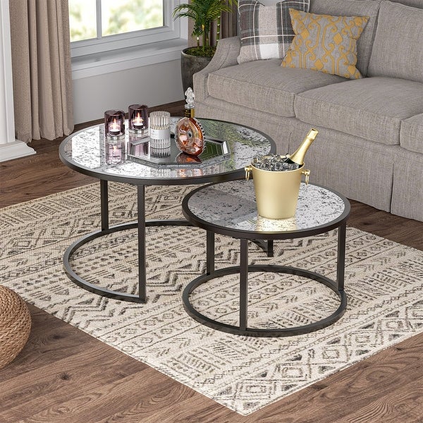 Set of 2 round coffee tables with metal frame and glass top table