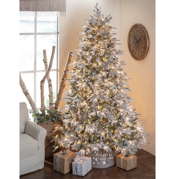 Enchanting 9 Foot Natural Cut Full Flocked Spruce with Warm White LED Lights