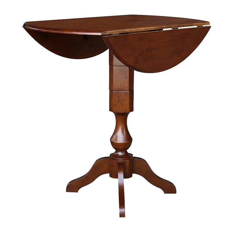 International Concepts Round Dual Drop Leaf Pedestal Dining Table