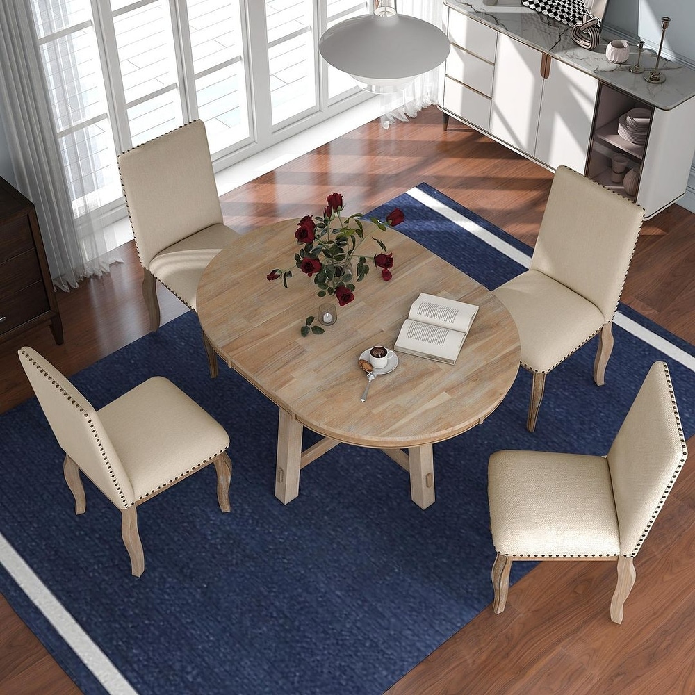 Expandable round dining table set for 4