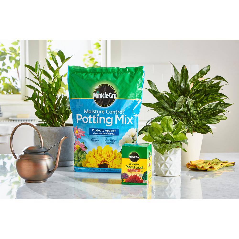 Miracle-Gro Moisture Control Potting Mix and Water Soluble All Purpose Plant Food VB3000554