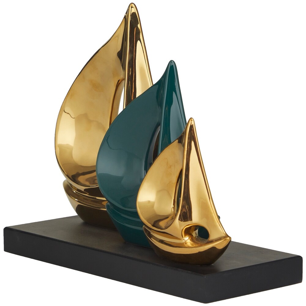 CosmoLiving by Cosmopolitan Gold Polystone Sail Boat Sculpture with Black Base   5.15 x 12.15 x 9.75