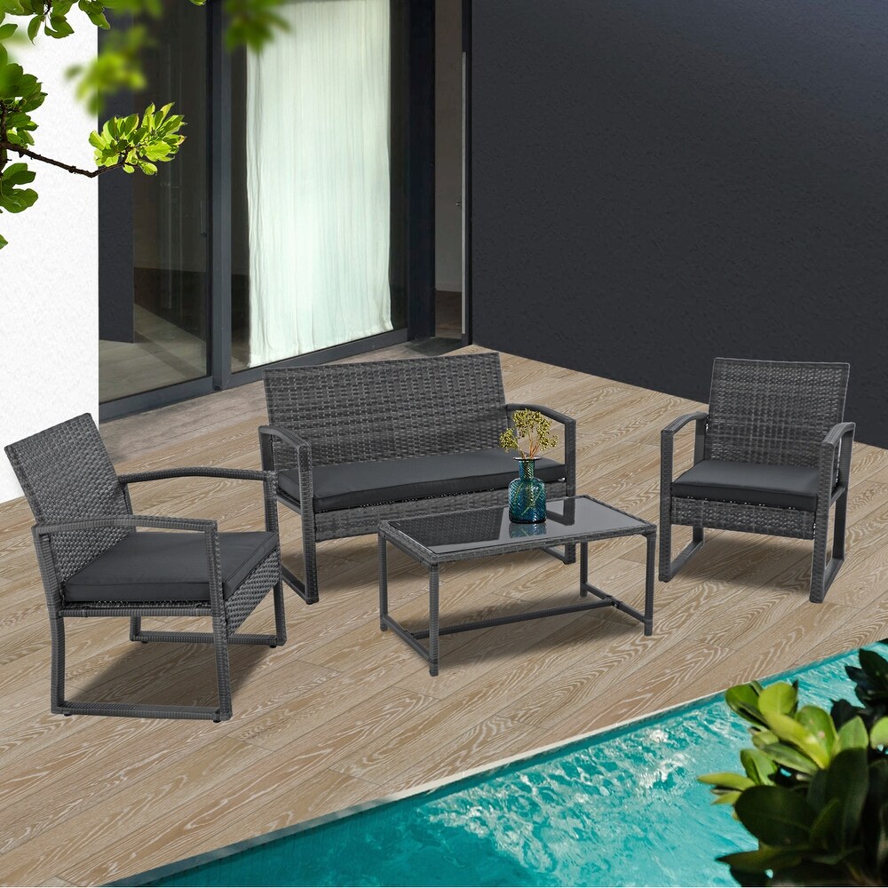 Steel/ Resin Wicker 4 piece Outdoor Patio Seating Set with Coffee Table