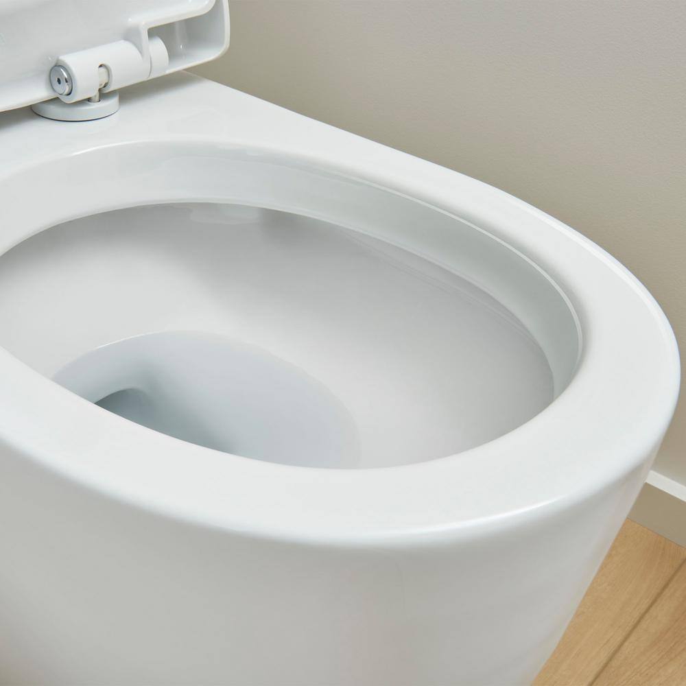 GROHE Essence 2-piece 1.28 GPF Single Flush Elongated Toilet with Left Hand Trip Lever in Alpine White Seat Included 39675000