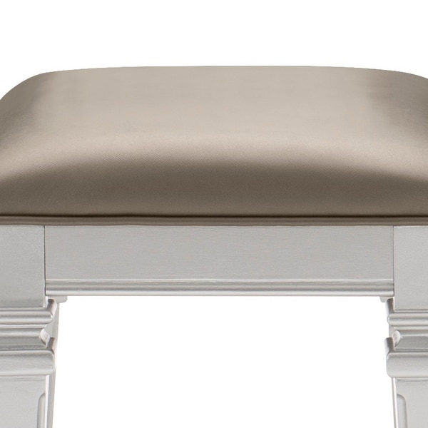 Leatherette Padded Vanity Stool with Tapered Legs and Molded Detail， Silver