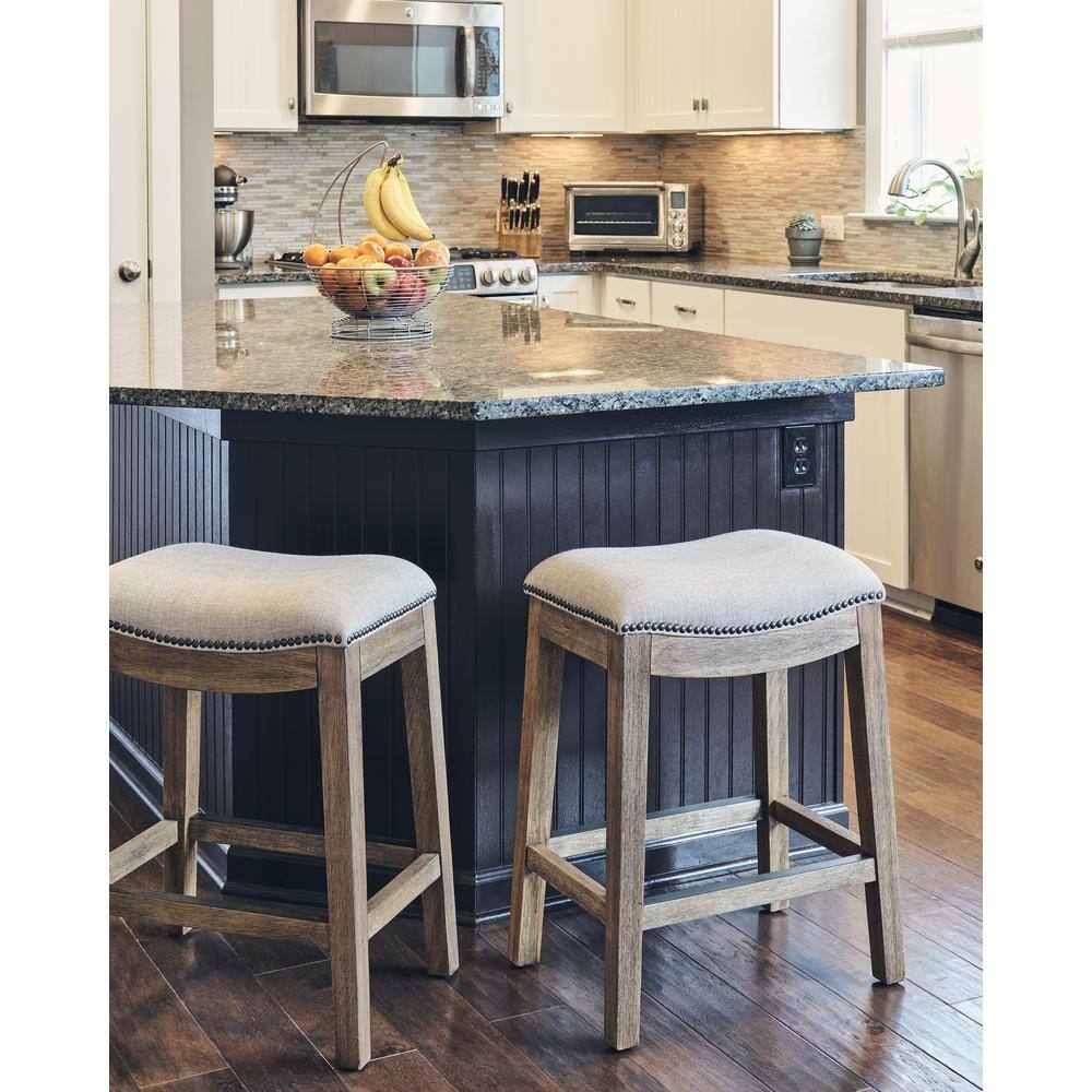 New Ridge Home Goods Saddle Backless Weathered Grey Wood 25.5 in. Counter-Height Bar Stool with Smoked Gray Linen Seat One Stool NH100154-FCS-WG