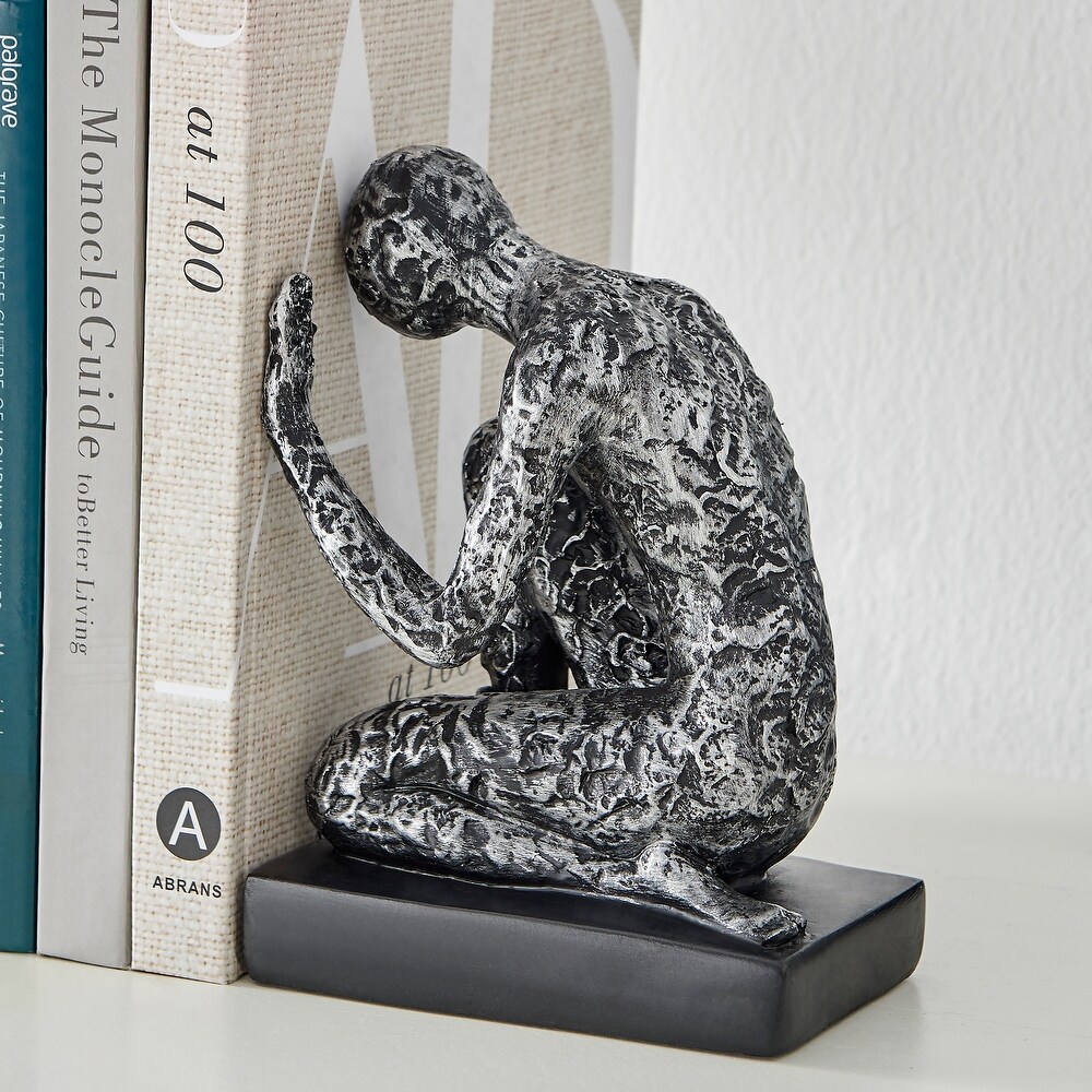 Danya B. Kneeling Figure Sculptures Polyresin Silver and Black Finish Bookend Set of 2