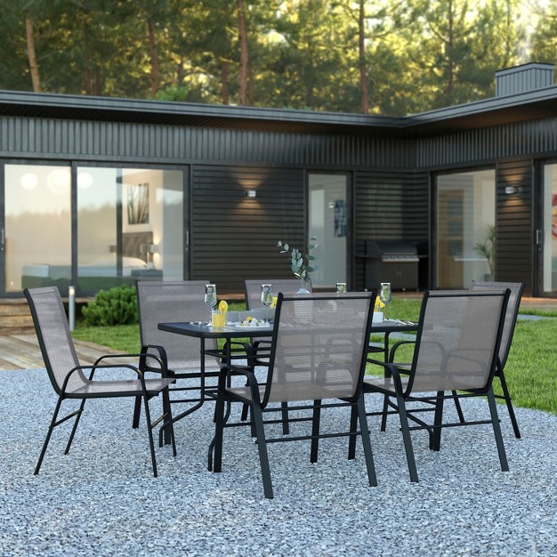 Emma And Oliver Seven Piece Patio Table Set With Metal Table With Tempered Glass Top And 6 Flex Comfort Stacking Chairs