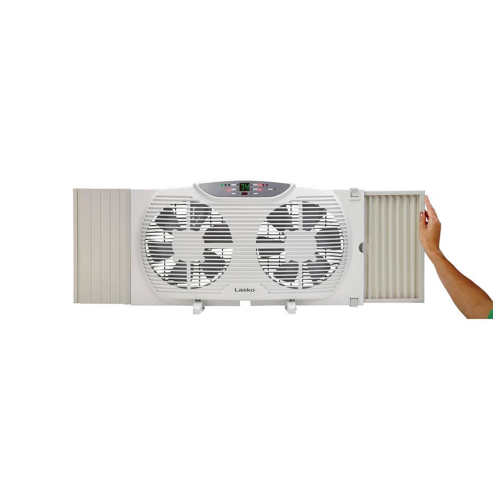 Lasko 9 in. Remote Control Electronically Reversible Twin Window Fan with Thermostat W09550