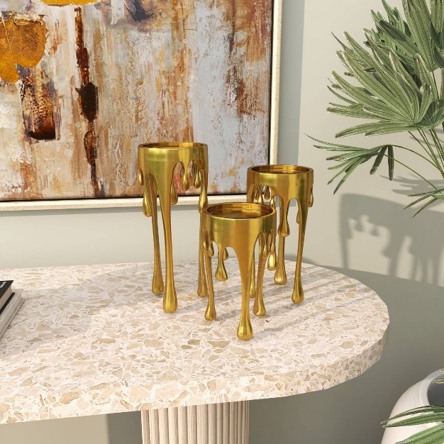 Aluminum Abstract Pillar Drip Set Of 3 Gold Candle Holder Cosmoliving By Cosmopolitan