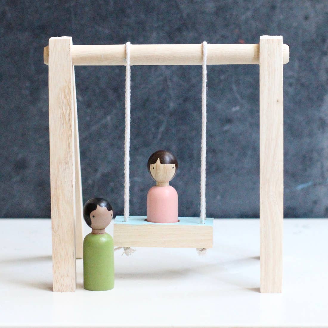 Wooden Swing Set and Dolls