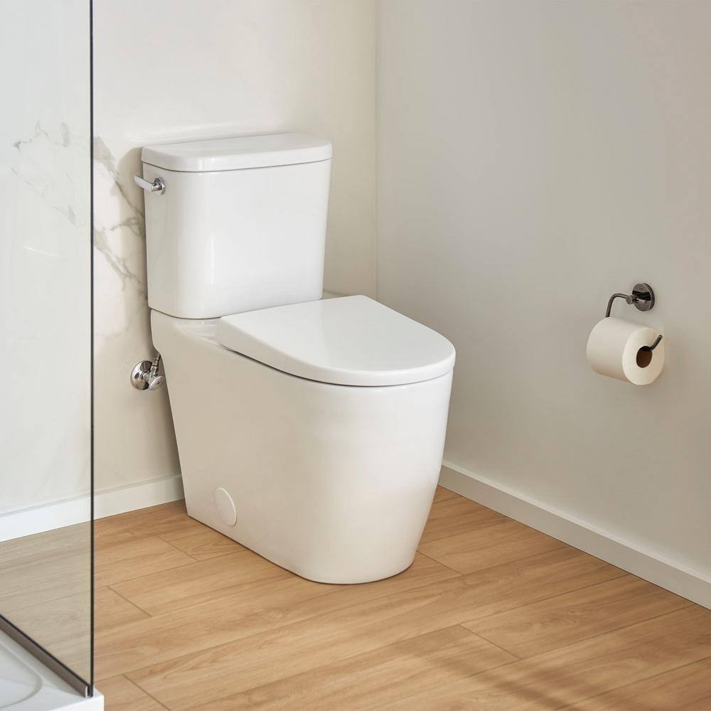 GROHE Essence 2-piece 1.28 GPF Single Flush Elongated Toilet with Left Hand Trip Lever in Alpine White Seat Included 39675000