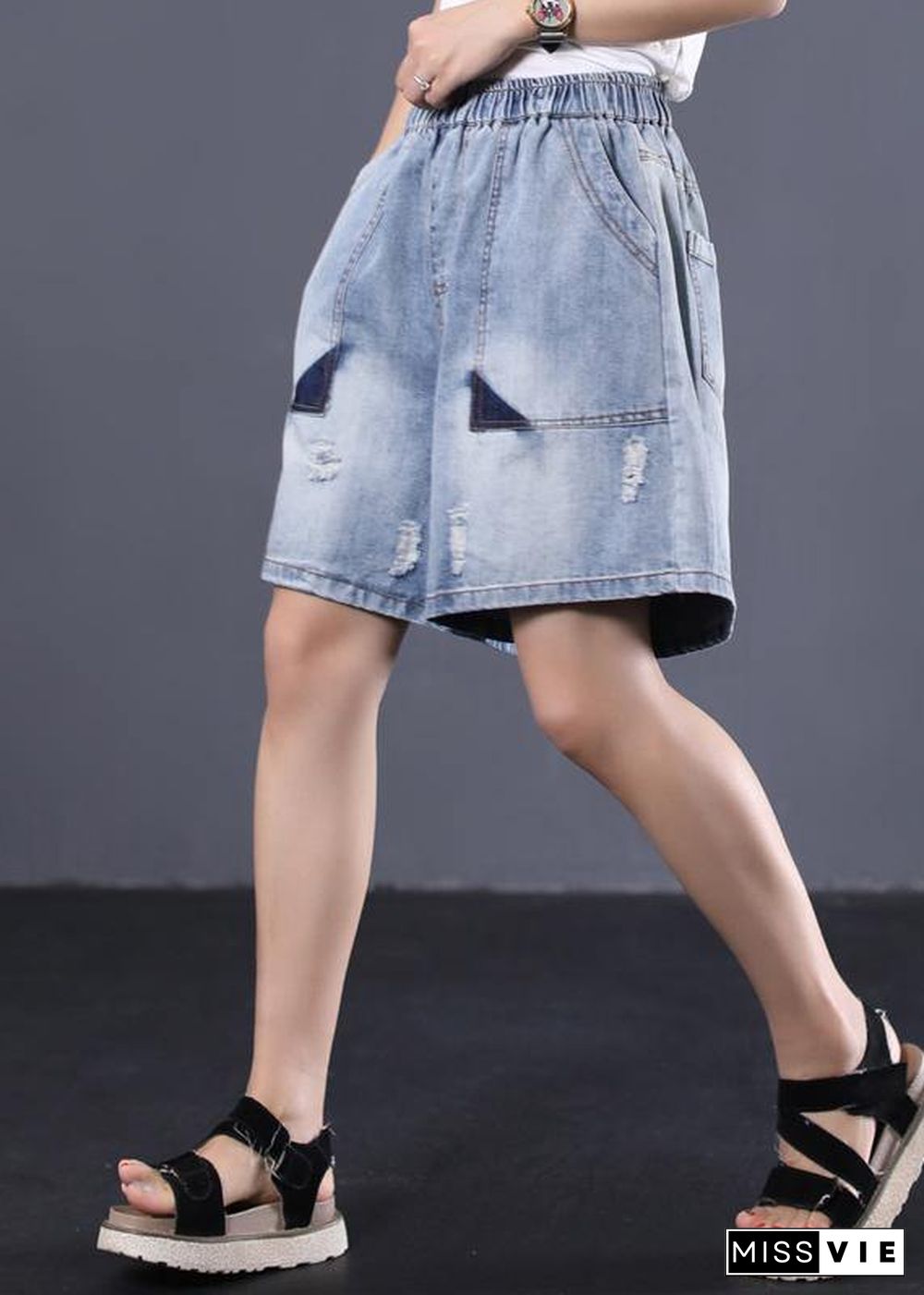 Korean version loose retro washed white Ming line denim shorts