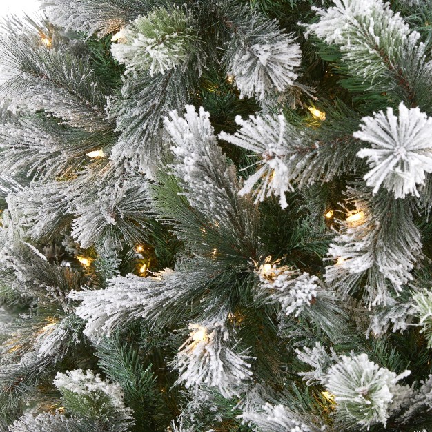 Nearly Natural 9-ft Flocked Oregon Pine Artificial Christmas Tree With 600 Clear Lights And 1580 Bendable Branches