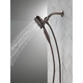 Delta SureDock Magnetic 7-Spray Patterns 1.75 GPM 4.94 in. Wall Mount Handheld Shower Head in Venetian Bronze 54810-RB-PK