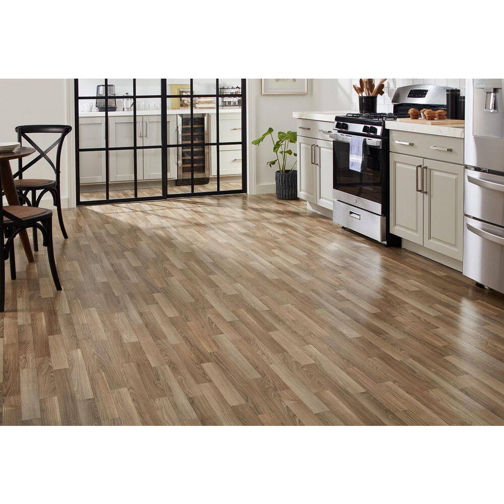 TrafficMaster Autumn Brown Oak Residential Vinyl Sheet Flooring 12 ft. Wide x Cut to Length U9160405K743G14