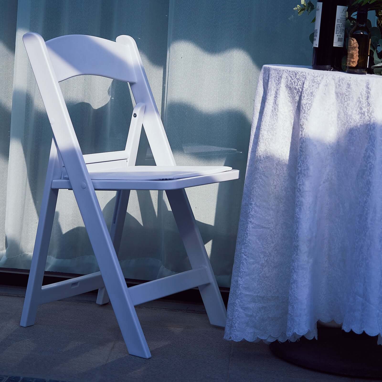 White Resin Folding Chair With Vinyl Padded Seat For Weddings, Indoor or Outdoor Events