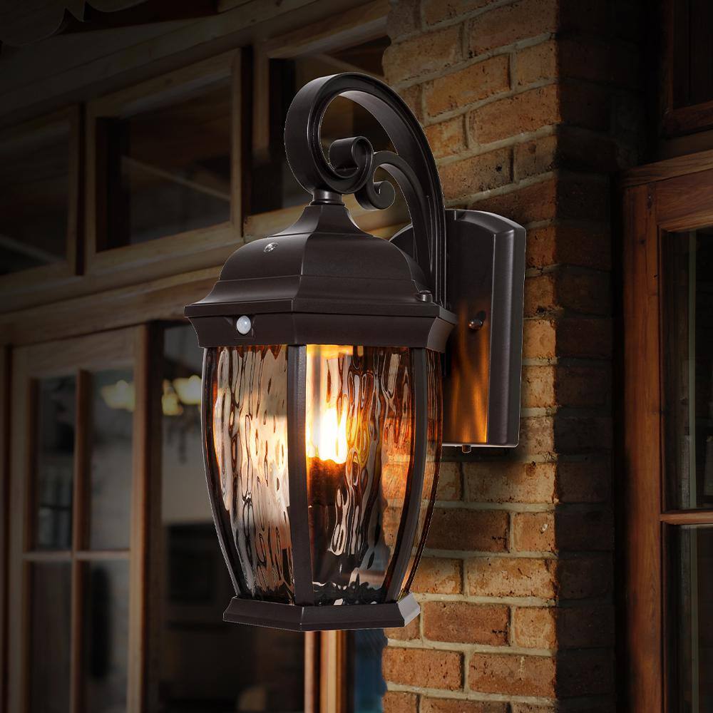 Home Decorators Collection Bronze Integrated LED Outdoor Wall Lantern Sconce with Flickering BulbClear Glass with Motion Sensor and Photocell FL-380HD