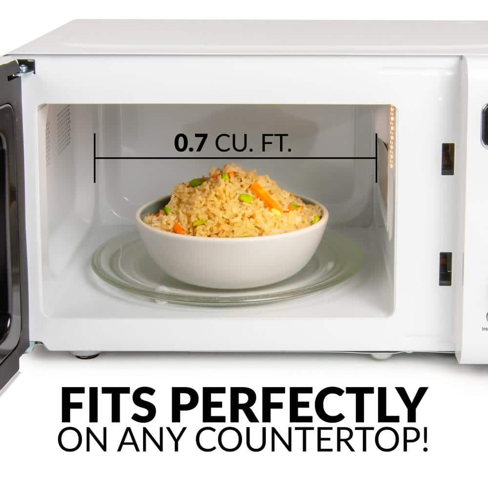 Nostalgia 07 cu ft Countertop Microwave in Retro White with Express Cooking